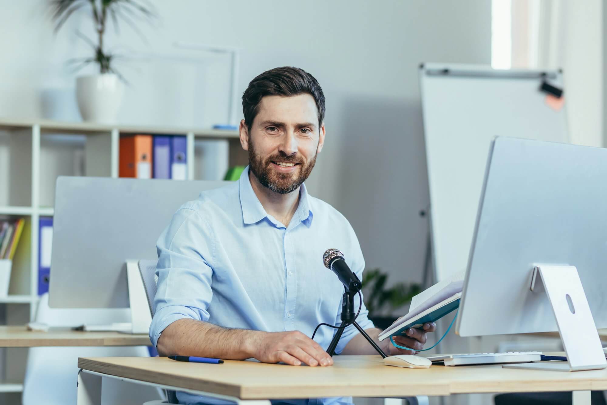 portrait-of-a-businessman-coach-a-man-looks-at-the-camera-and-smiles.jpg